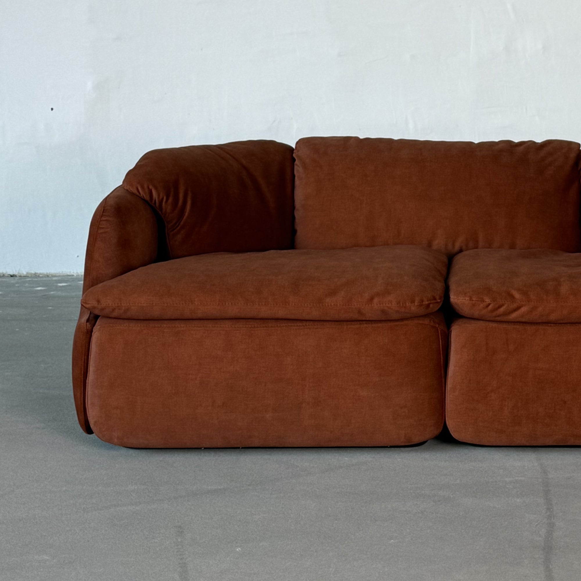 CONFIDENTIAL rusty red velvet sofa
