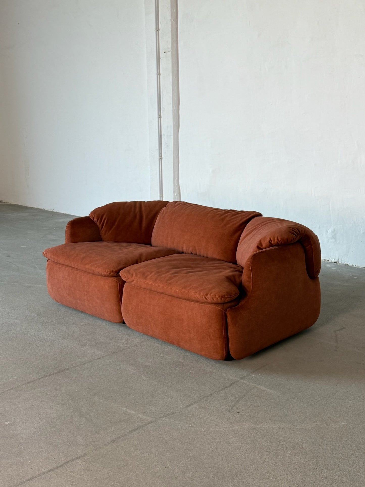 CONFIDENTIAL rusty red velvet sofa