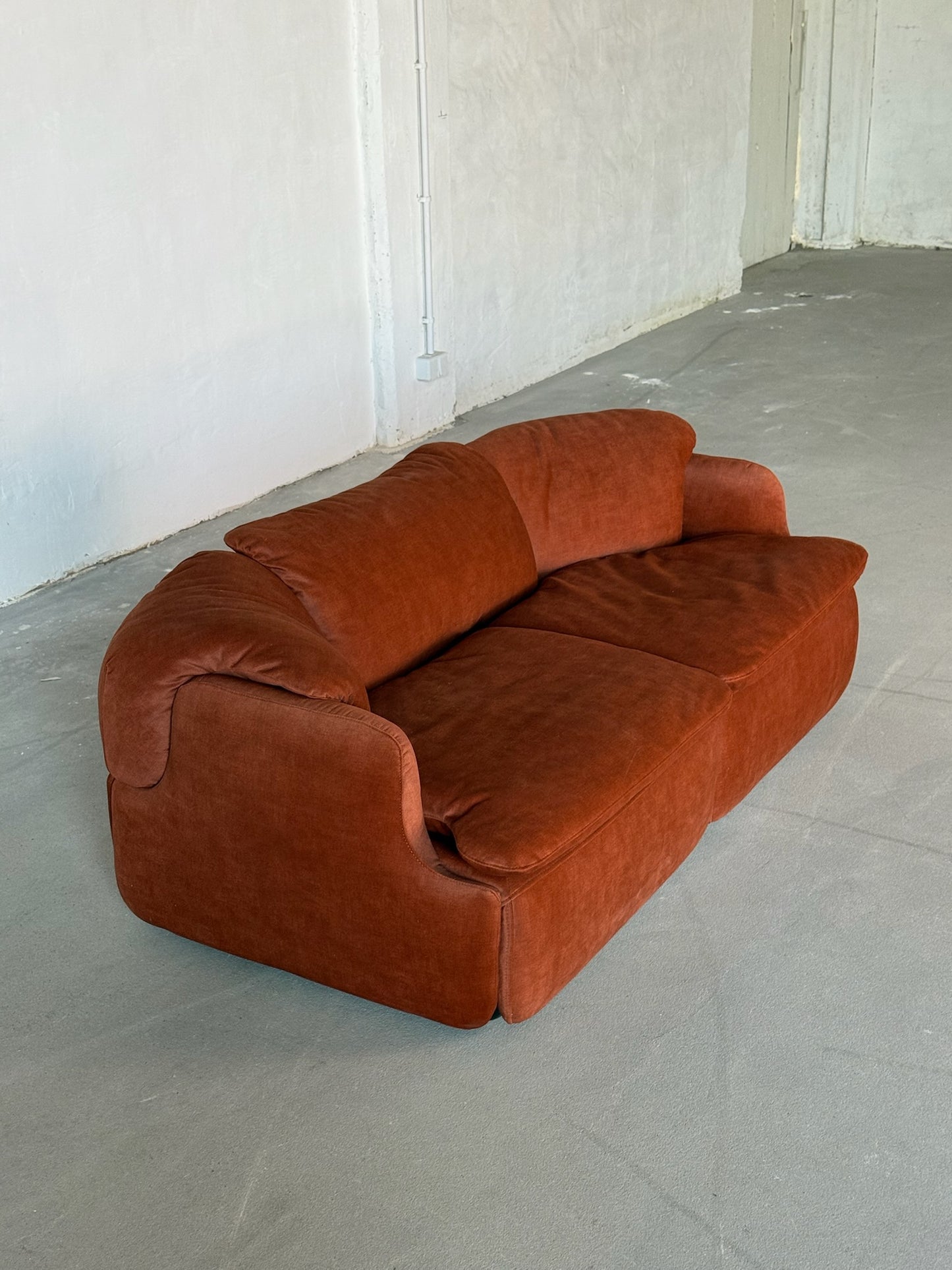 CONFIDENTIAL rusty red velvet sofa