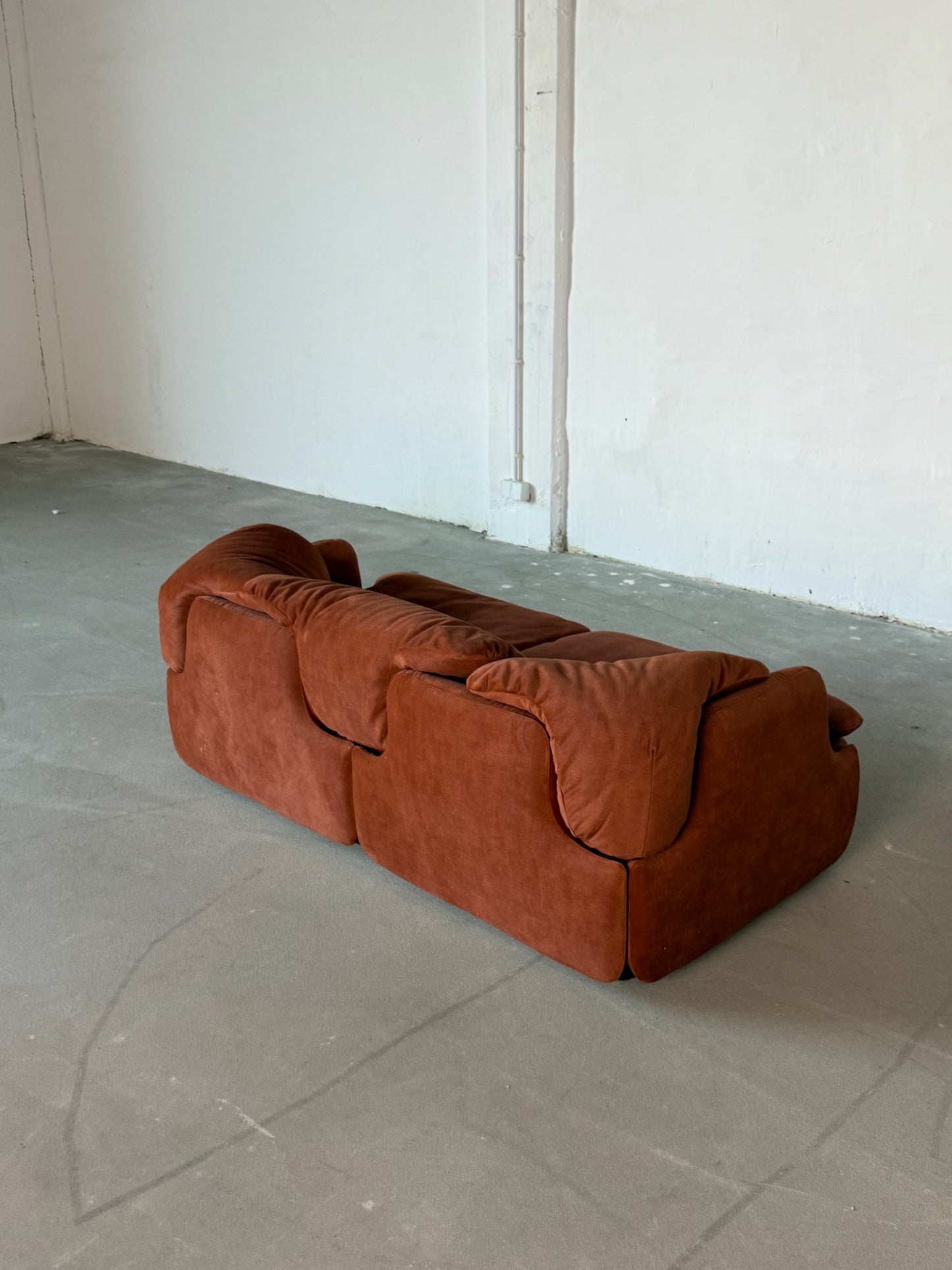 CONFIDENTIAL rusty red velvet sofa
