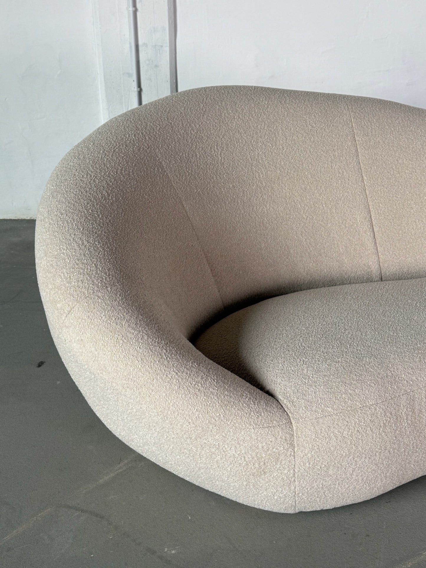 XL curved bouclé sofa