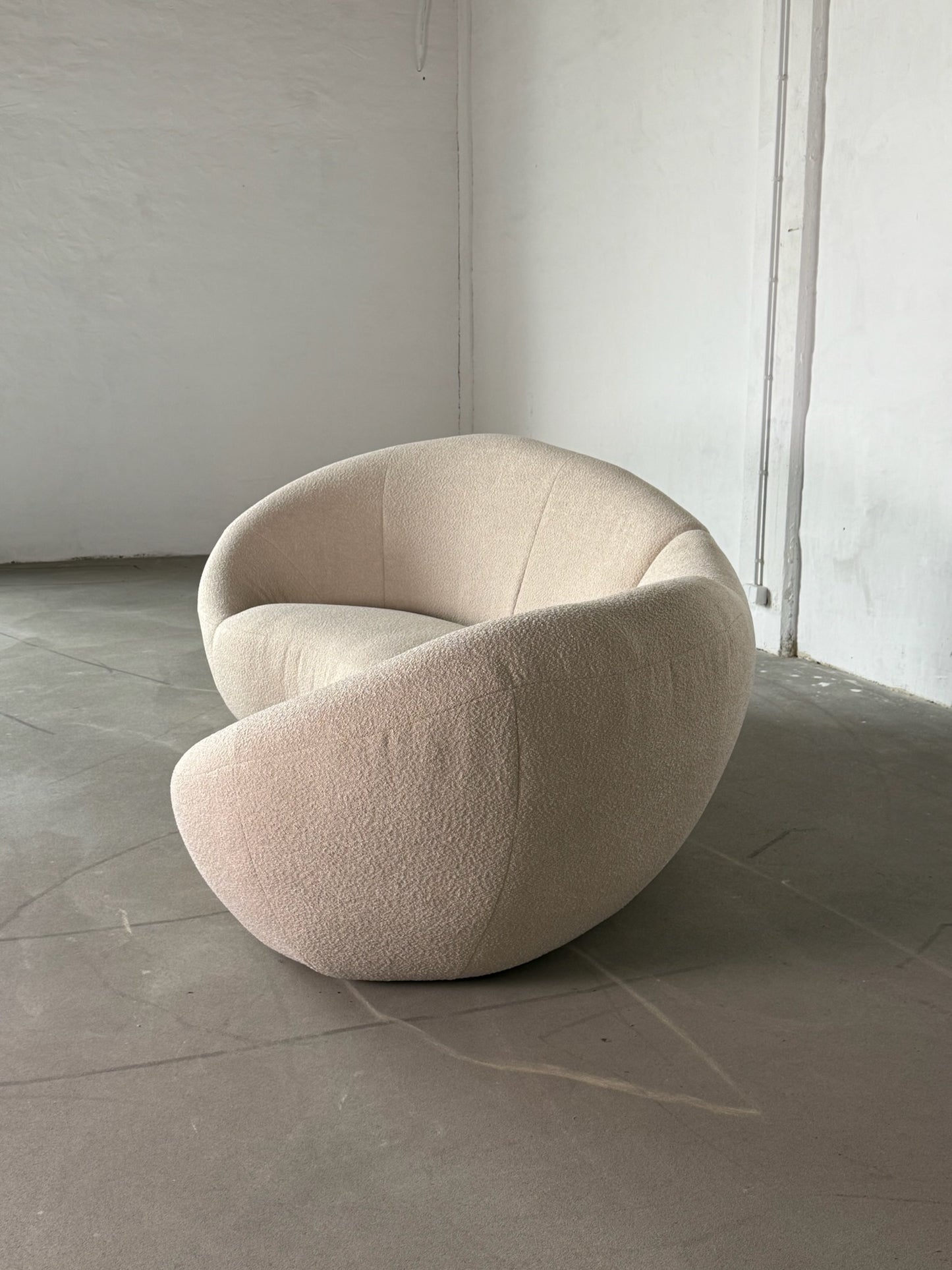XL curved bouclé sofa