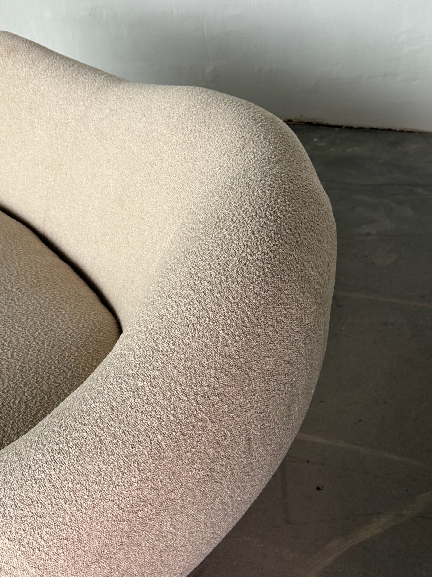 XL curved bouclé sofa