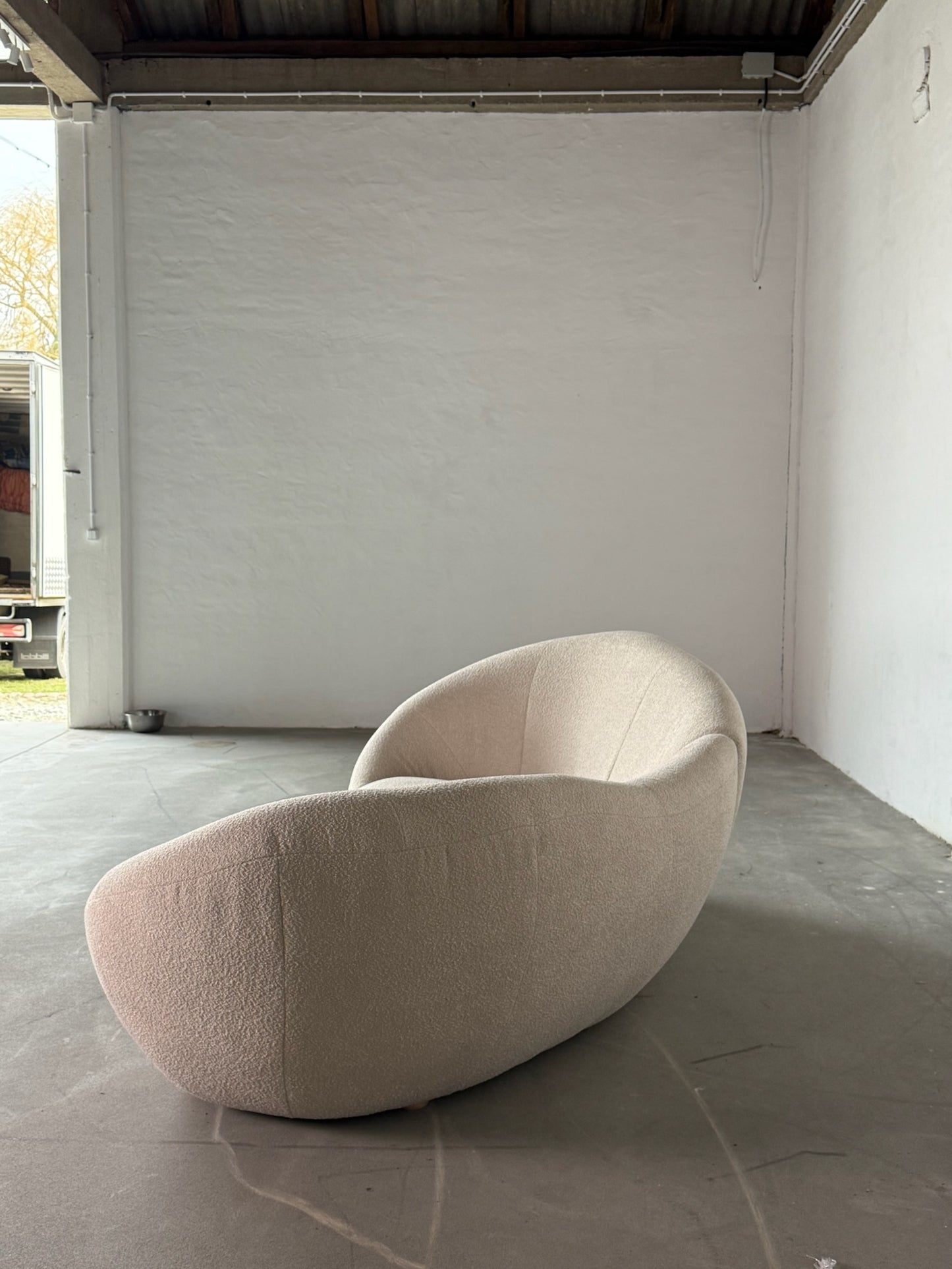 XL curved bouclé sofa